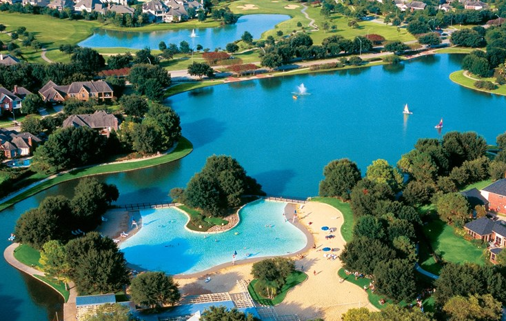 Cane Island Cinco Ranch Katy Texas aerial lagoon pool lakes master-planned community — family law attorney Katy TX