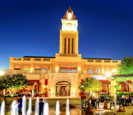 LaCenterra at Cinco Ranch Katy Texas clock tower at night — family law attorney Katy TX