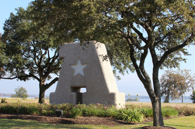 Atascocita Texas stone A monument with Texas star and Lake Houston — family law attorney Houston TX serving Atascocita