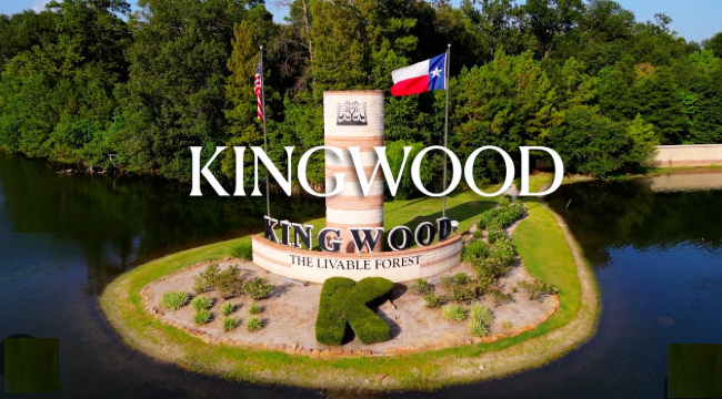 Kingwood The Livable Forest monument aerial Texas flags — family law attorney Kingwood TX