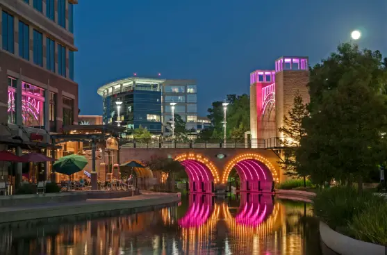 The Woodlands Town Center Waterway at night &mdash; family law attorneys serving The Woodlands, TX